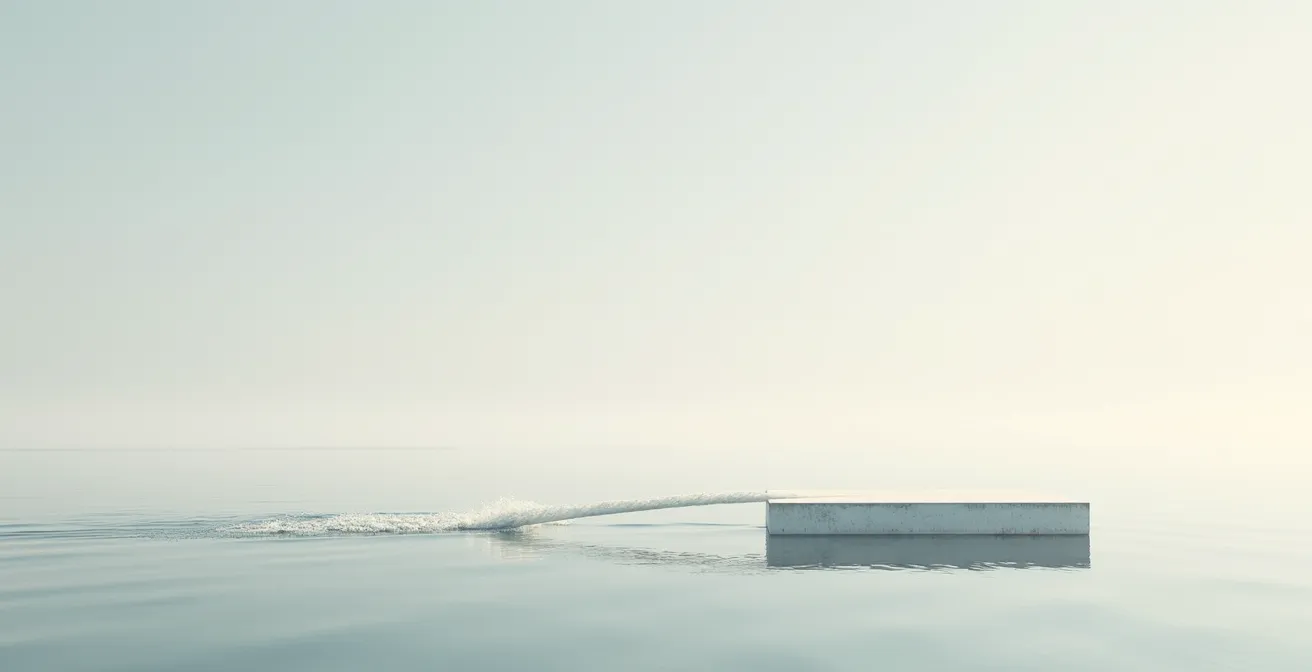 Wide environmental shot of a minimalist landscape with one moving element creating focused attention