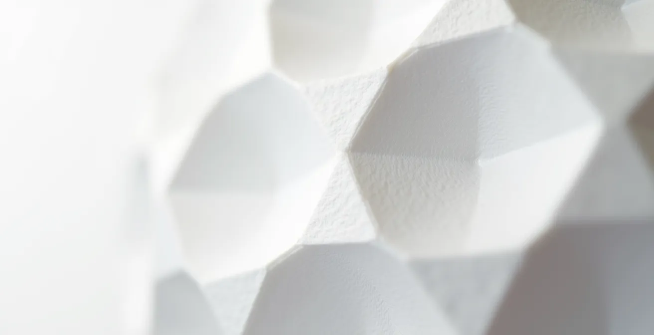 Split view showing low-poly digital model versus 3D printed physical sculpture highlighting mesh requirements